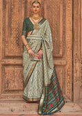 Tea Green Woven Patola Silk Saree