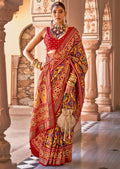 Mustard Yellow & Red Woven Patola Silk Saree