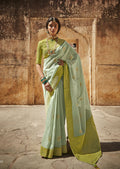 Mint Green Woven Designer Saree With Heavy Embroidered Blouse