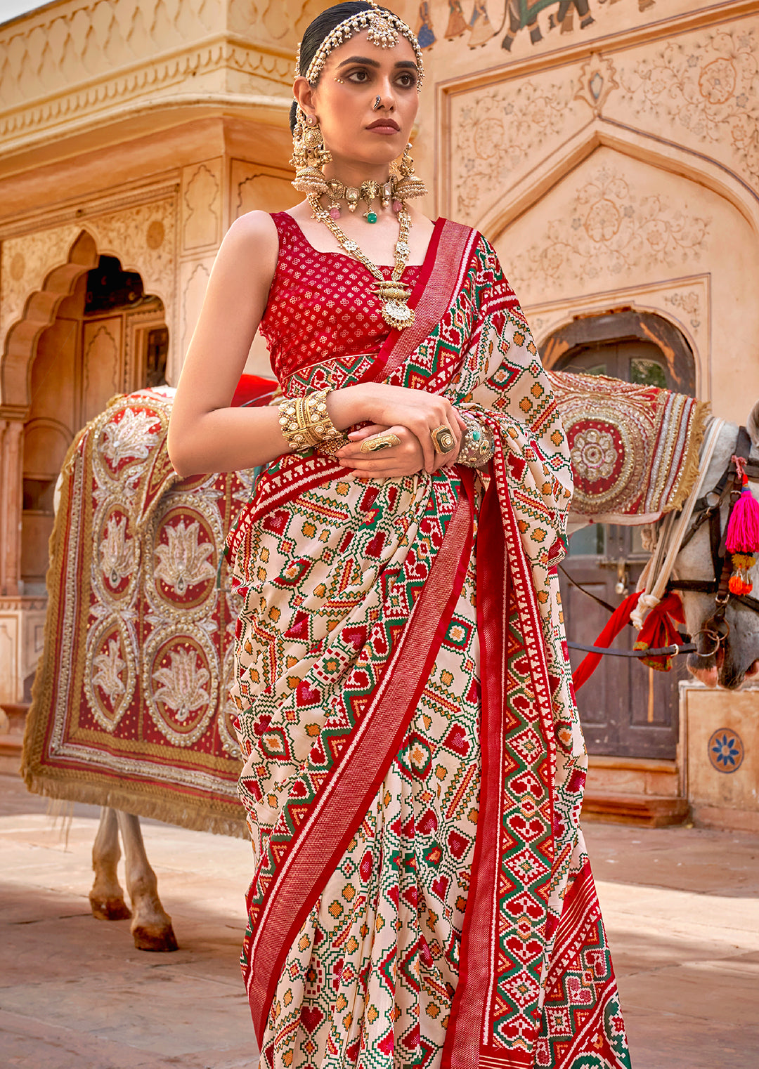 Pearl White & Red	Woven Patola Silk Saree