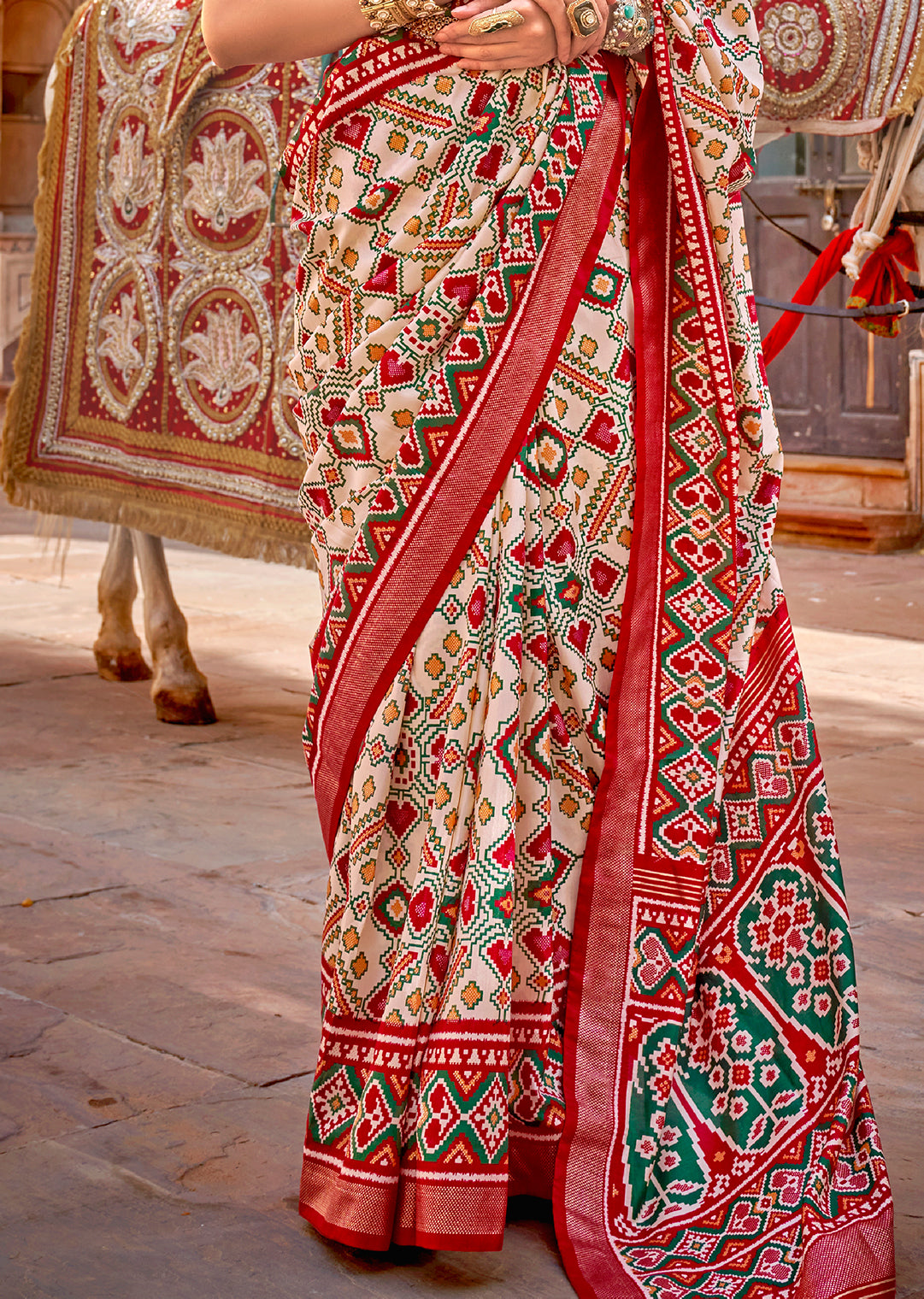 Pearl White & Red	Woven Patola Silk Saree
