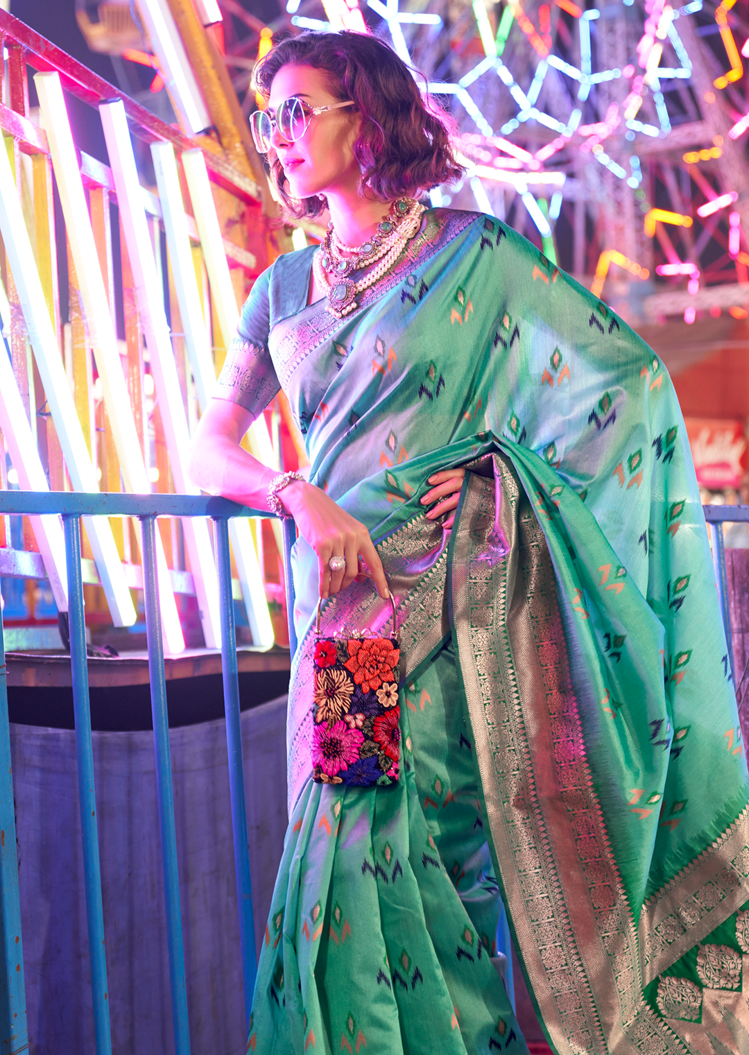 Turquoise Green Woven Pure Handloom Ikat Silk Saree