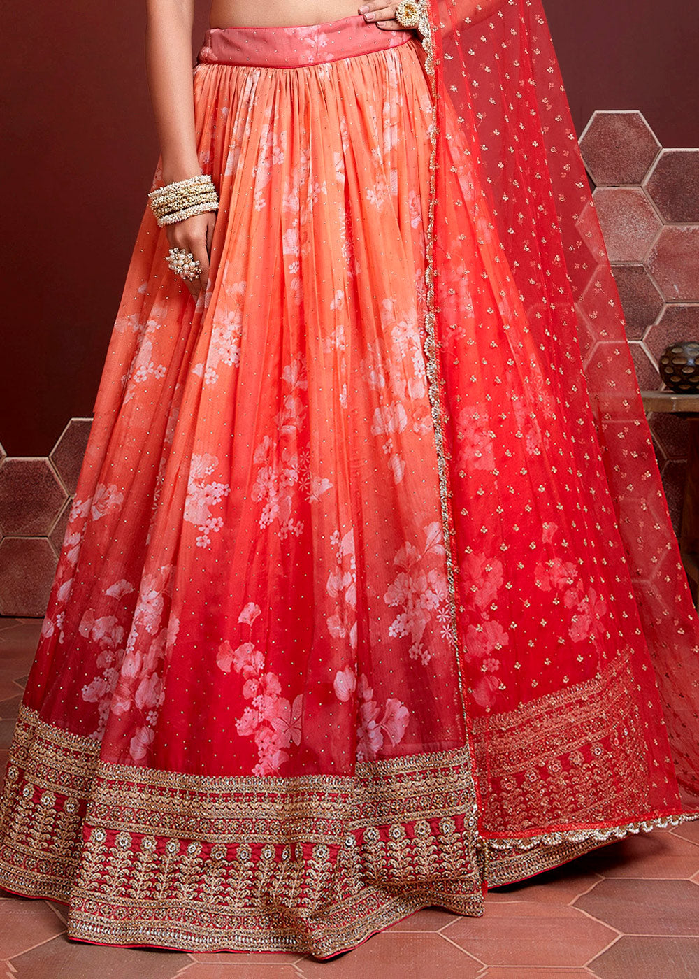 SHADED SUNSET ORANGE SILK LEHENGA WITH HEAVY EMBROIDERED BLOUSE