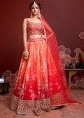 SHADED SUNSET ORANGE SILK LEHENGA WITH HEAVY EMBROIDERED BLOUSE
