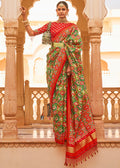 GREEN ZARI WOVEN TUSSAR PATOLA SILK SAREE WITH LAGDI PATTA