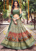 TEA GREEN WOVEN LAGDI PATTA GAJJI SILK LEHENGA WITH HEAVY HANDWORKED BLOUSE