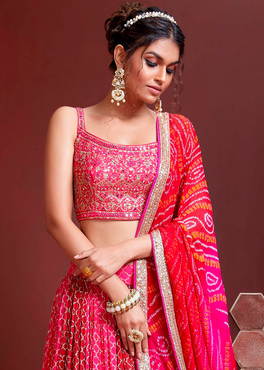CERISE PINK SILK LEHENGA WITH HEAVY EMBROIDERED BLOUSE