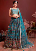 STEEL BLUE SILK LEHENGA WITH HEAVY EMBROIDERED BLOUSE
