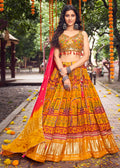 MUSTARD YELLOW WOVEN LAGDI PATTA GAJJI SILK LEHENGA WITH HEAVY HANDWORKED BLOUSE
