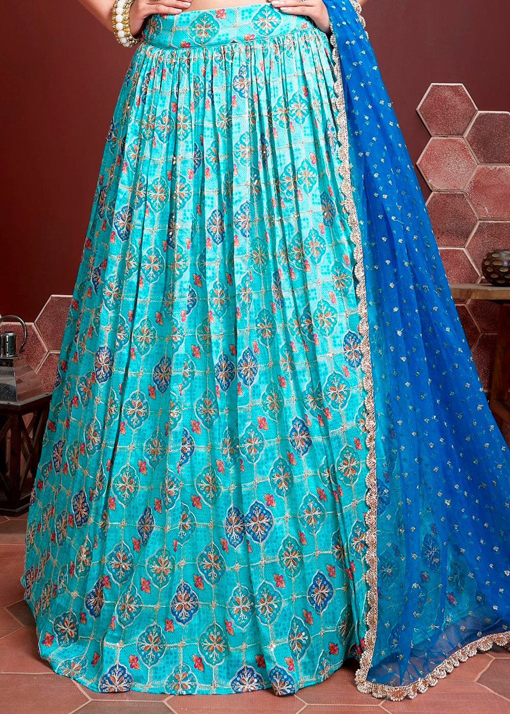 DEEP SKY-BLUE SILK LEHENGA WITH HEAVY EMBROIDERED BLOUSE