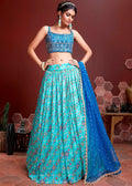 DEEP SKY-BLUE SILK LEHENGA WITH HEAVY EMBROIDERED BLOUSE
