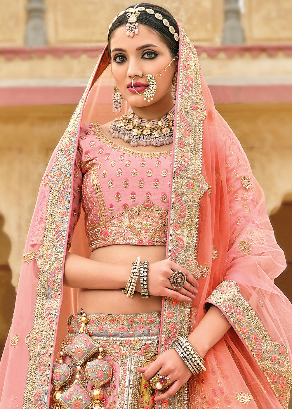 PEACH HEAVY EMBROIDERED DESIGNER BRIDAL LEHENGA