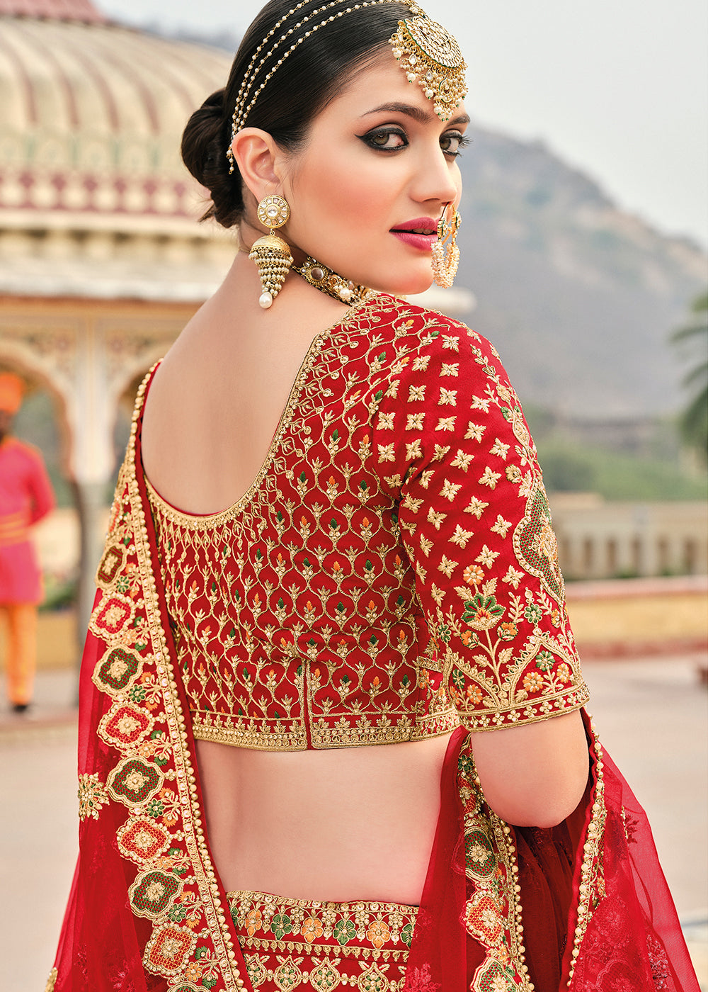 RED HEAVY EMBROIDERED DESIGNER BRIDAL LEHENGA