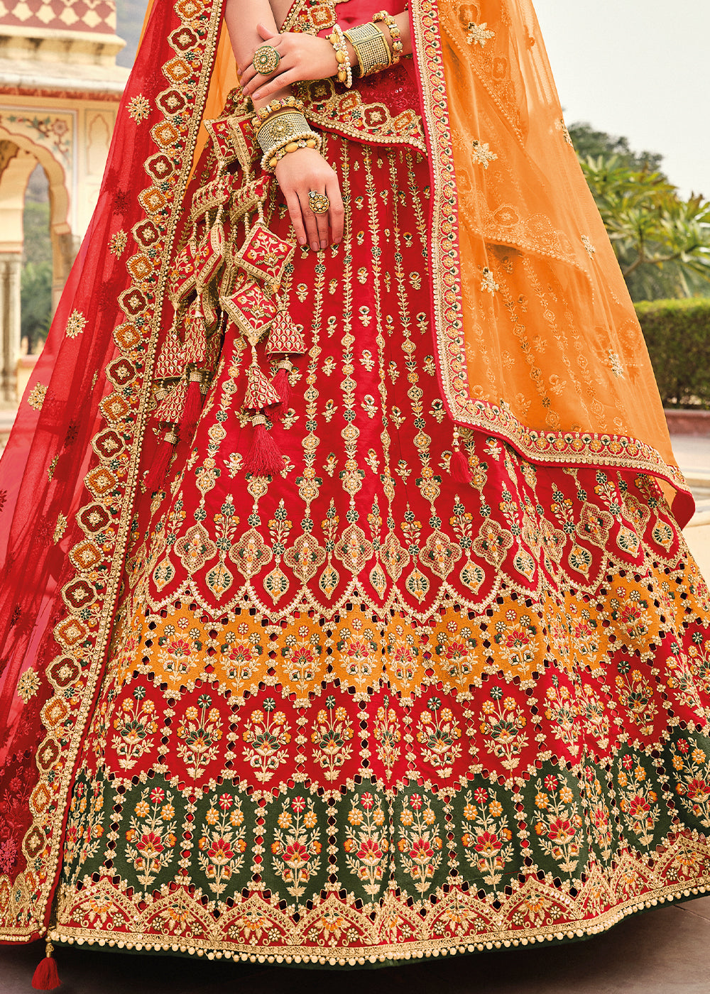 RED HEAVY EMBROIDERED DESIGNER BRIDAL LEHENGA