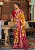MUSTARD YELLOW WOVEN PATOLA SILK SAREE