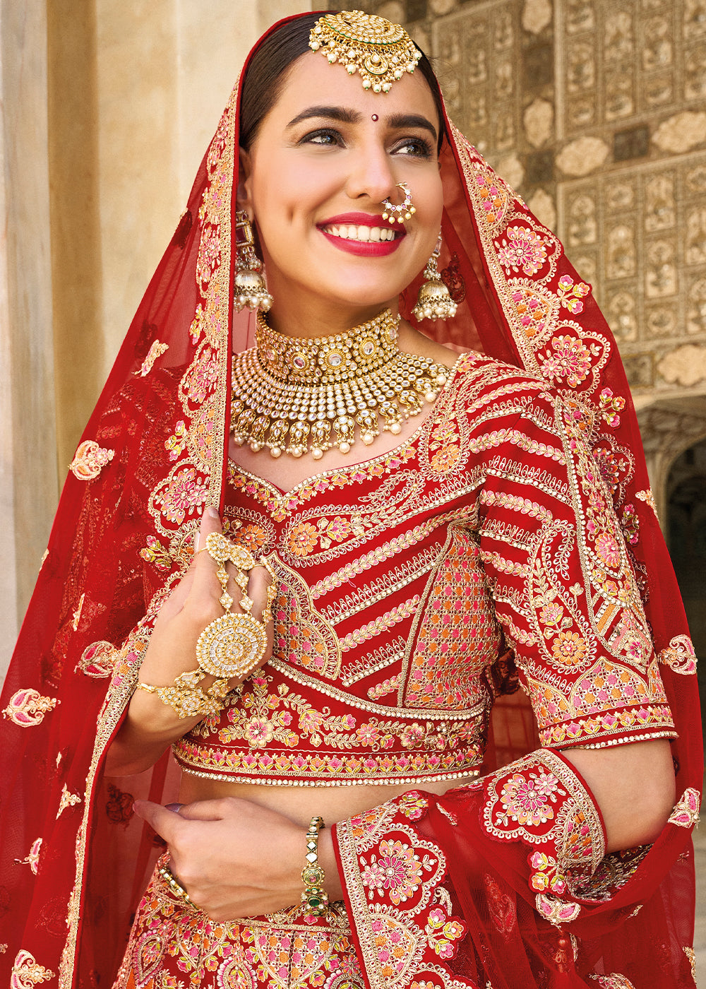 RED HEAVY EMBROIDERED DESIGNER BRIDAL LEHENGA