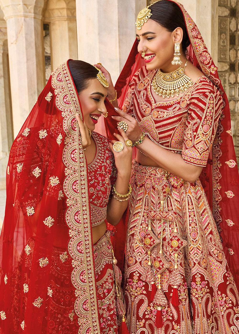 RED HEAVY EMBROIDERED DESIGNER BRIDAL LEHENGA