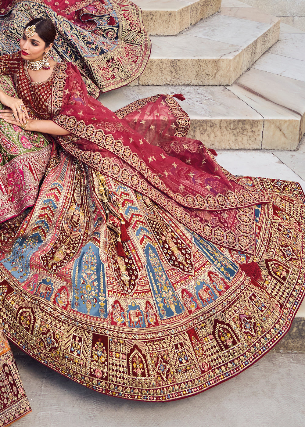 MAROON RED HEAVY EMBROIDERED DESIGNER BRIDAL LEHENGA zarikaariindia