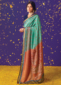 AQUA BLUE WOVEN PURE BRASSO CHIFFON SAREE WITH EMBROIDERED SILK BLOUSE