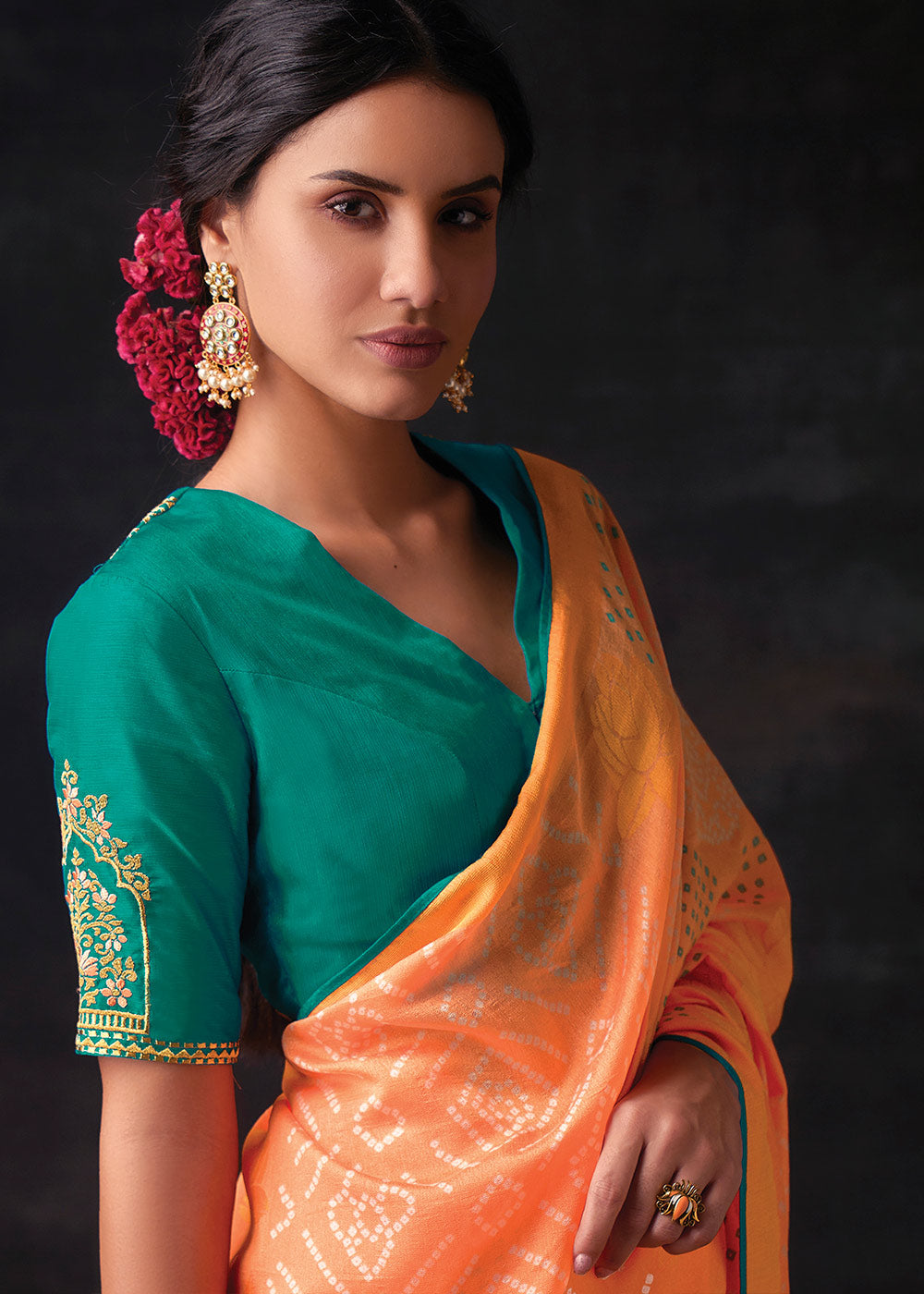 MELON ORANGE WOVEN PURE BRASSO CHIFFON SAREE WITH EMBROIDERED SILK BLOUSE