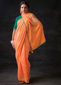 MELON ORANGE WOVEN PURE BRASSO CHIFFON SAREE WITH EMBROIDERED SILK BLOUSE