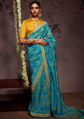 DEEP SKY BLUE WOVEN PURE BRASSO CHIFFON SAREE WITH BROCADE BLOUSE