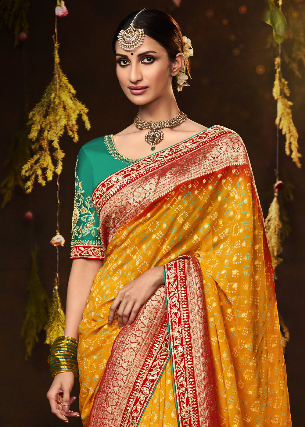 MUSTARD YELLOW WOVEN PURE GEORGETTE BANDHANI SAREE WITH BANARASI SILK BORDER & HEAVY EMBROIDERED BLOUSE
