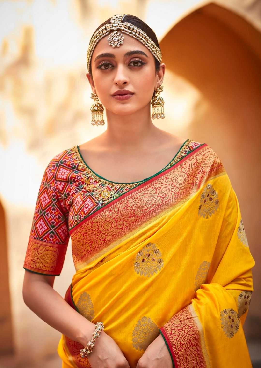 Mustard Yellow Woven Traditional Patola Silk Saree With Embroidered Silk Blouse