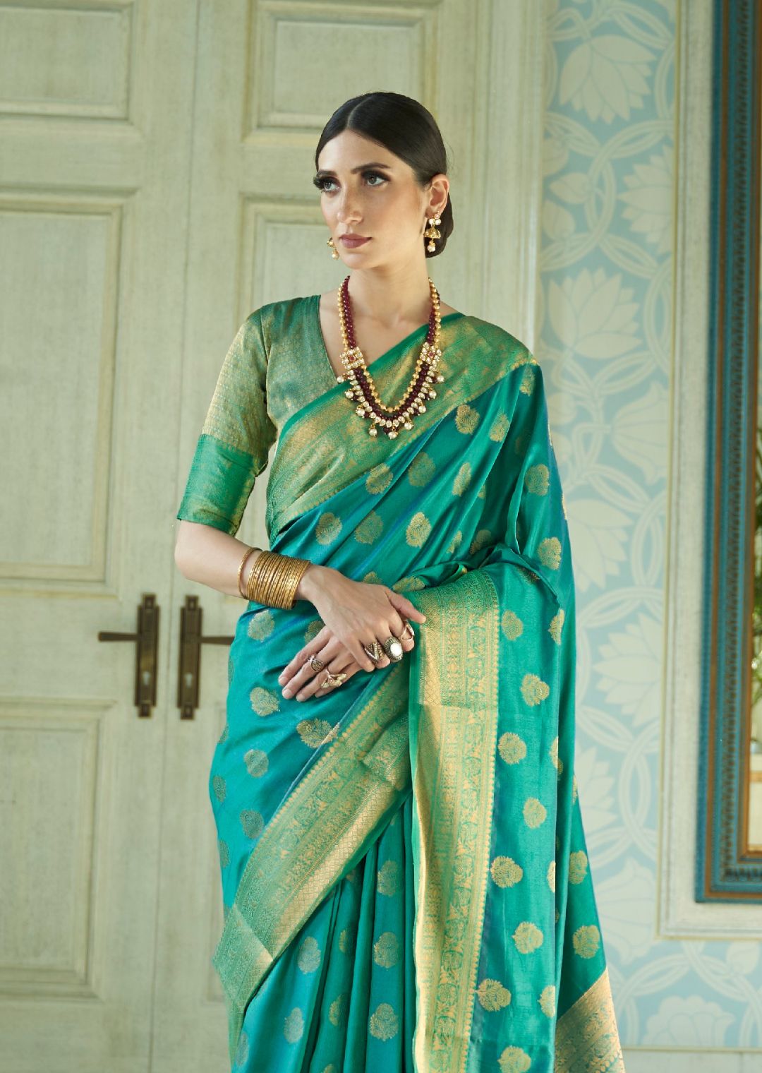 Turquoise Green Woven Handloom Zari Silk Saree