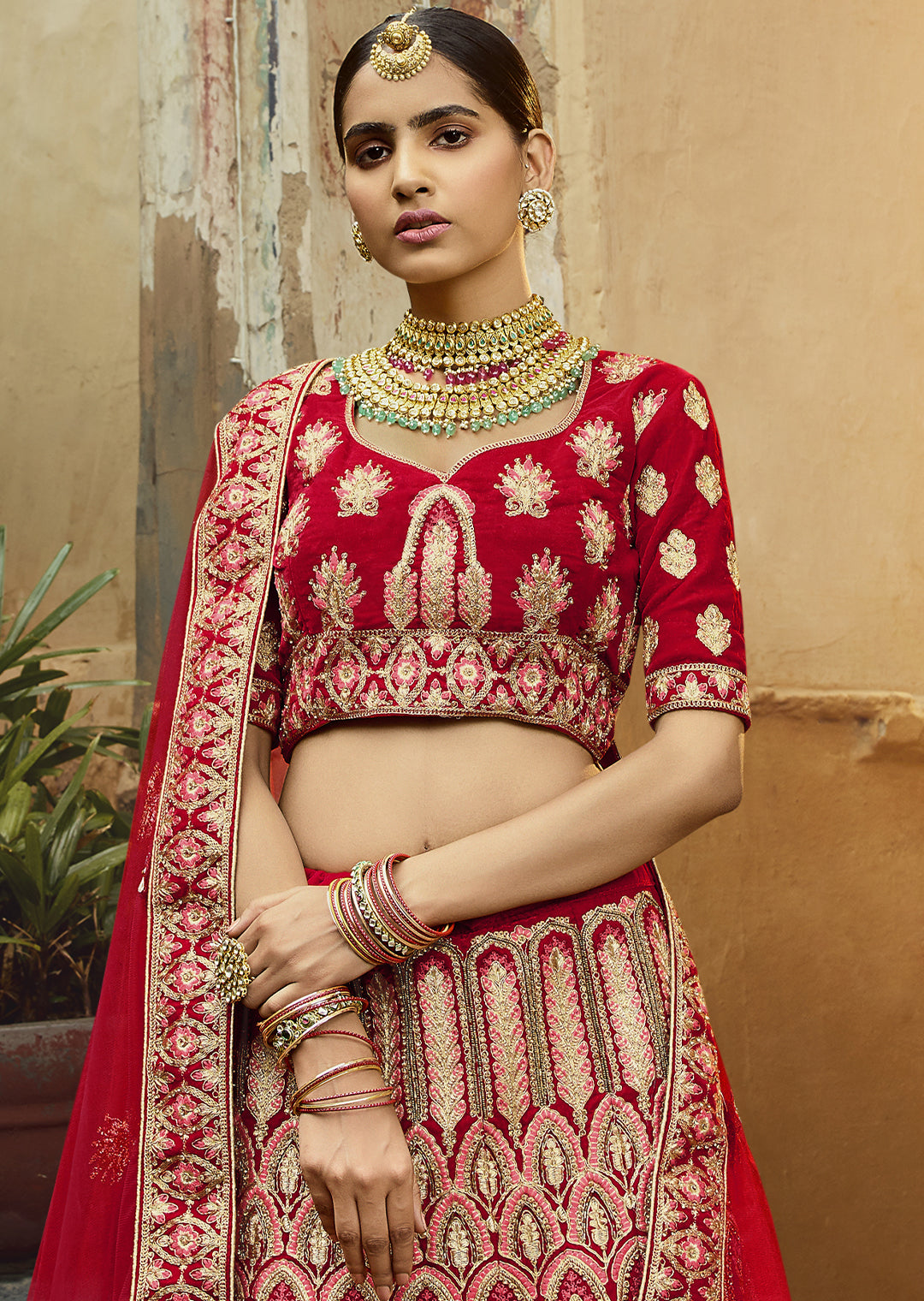 RED HEAVY ZARI EMBROIDERED PREMIUM VELVET DESIGNER BRIDAL LEHENGA