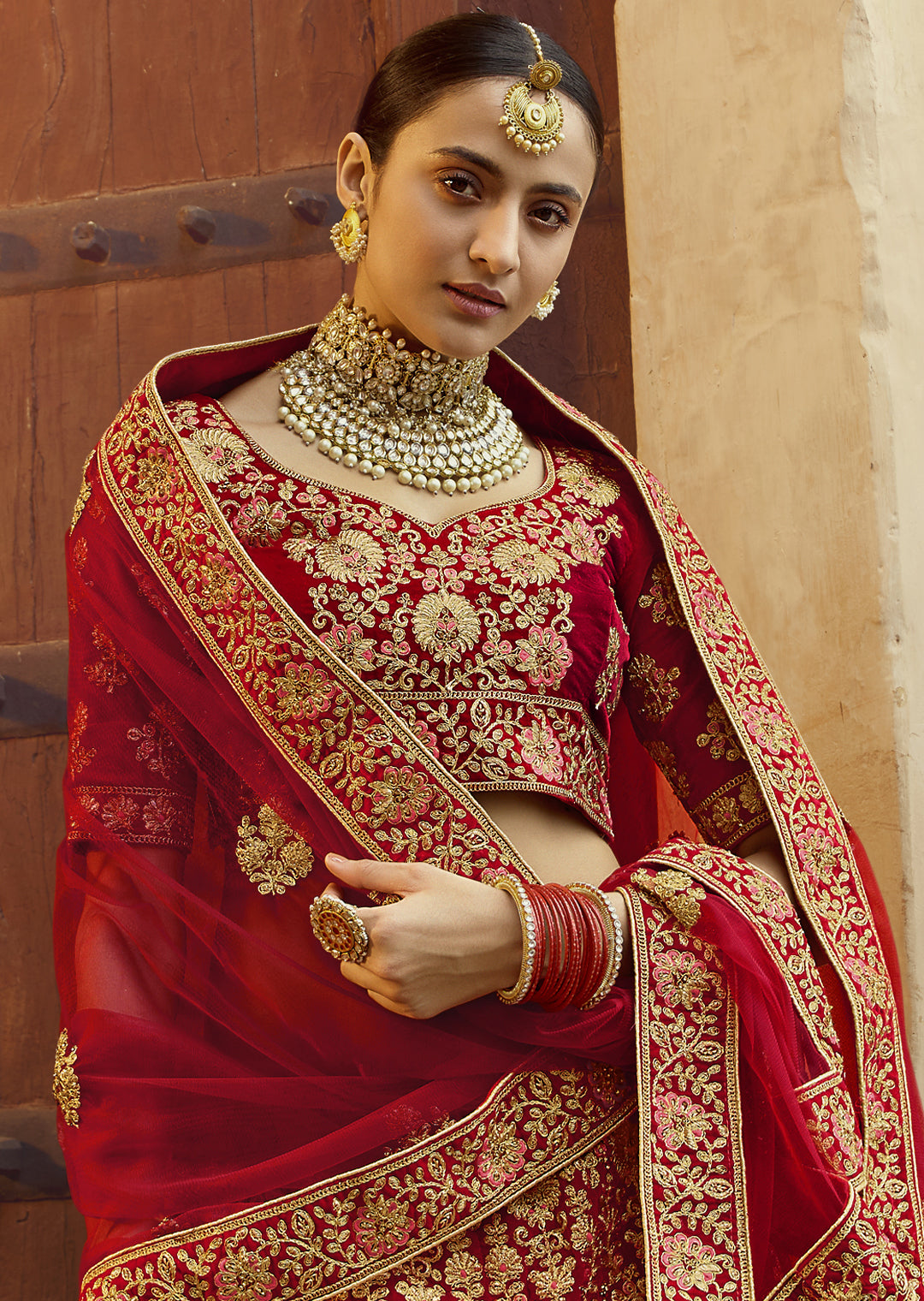 RED HEAVY ZARI EMBROIDERED PREMIUM VELVET DESIGNER BRIDAL LEHENGA