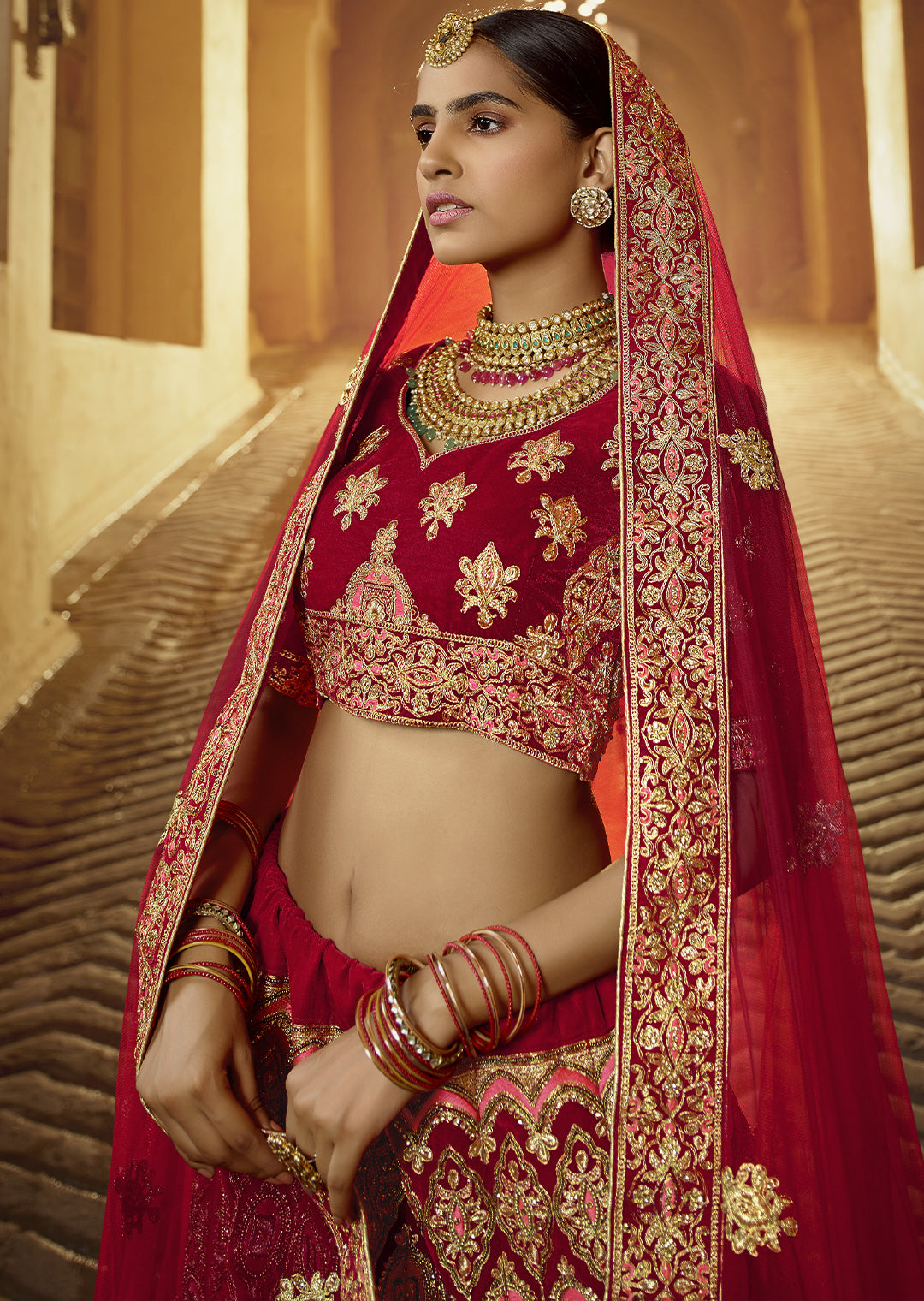 RED HEAVY ZARI EMBROIDERED PREMIUM VELVET DESIGNER BRIDAL LEHENGA