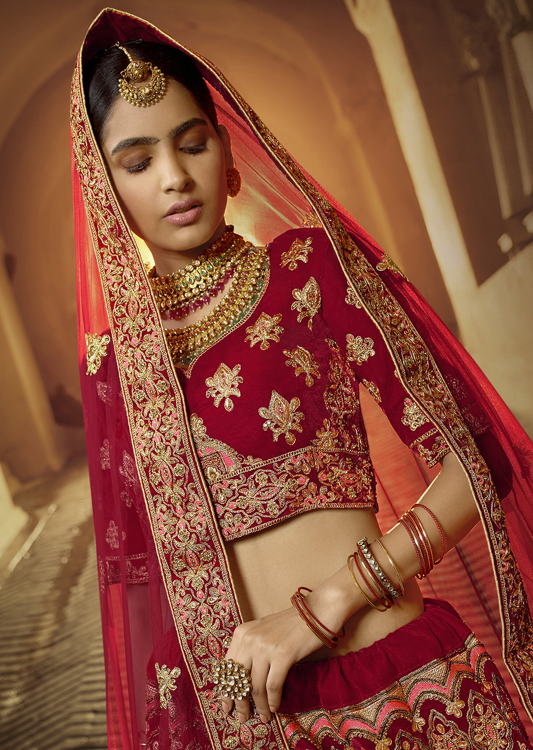RED HEAVY ZARI EMBROIDERED PREMIUM VELVET DESIGNER BRIDAL LEHENGA
