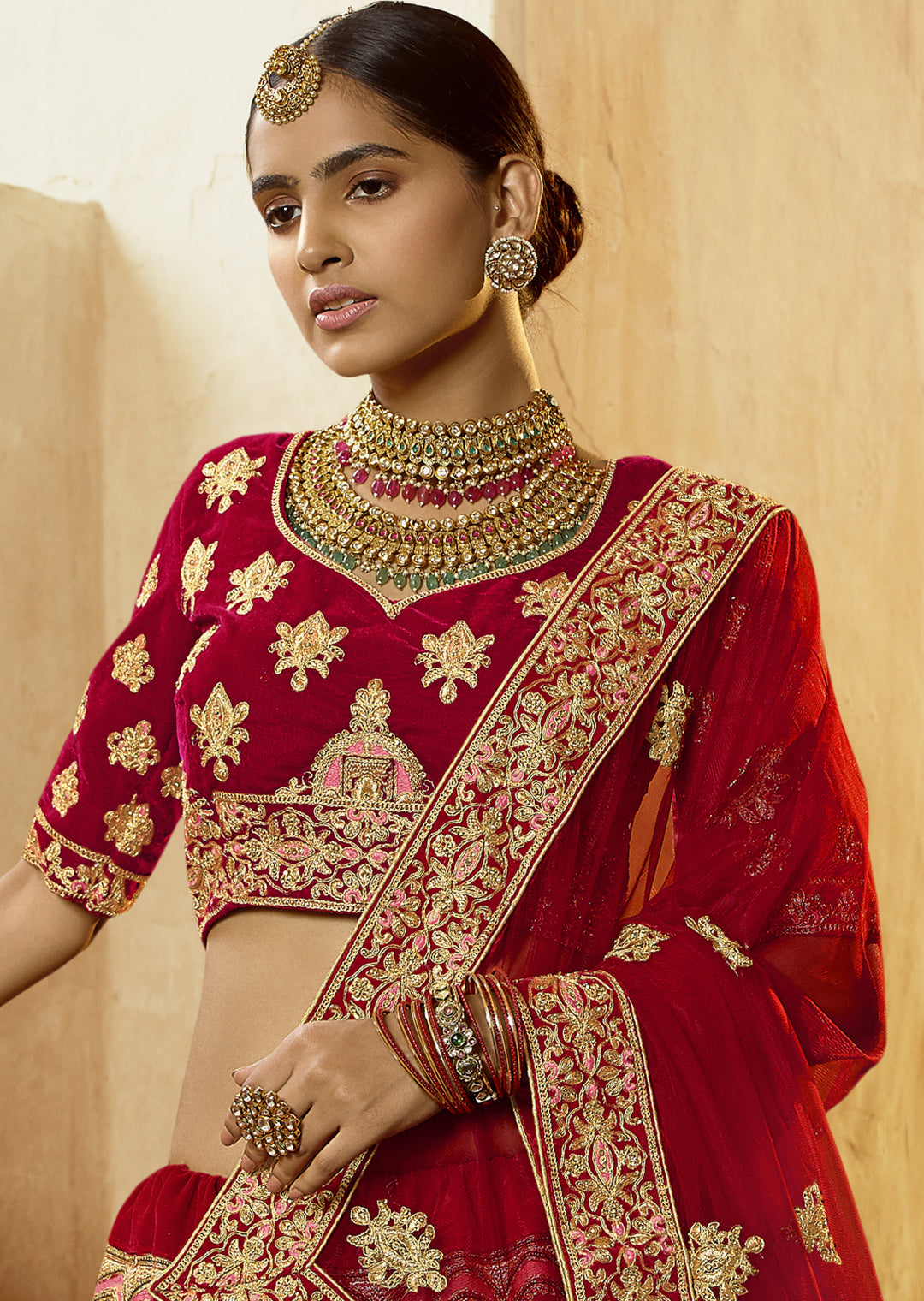 RED HEAVY ZARI EMBROIDERED PREMIUM VELVET DESIGNER BRIDAL LEHENGA