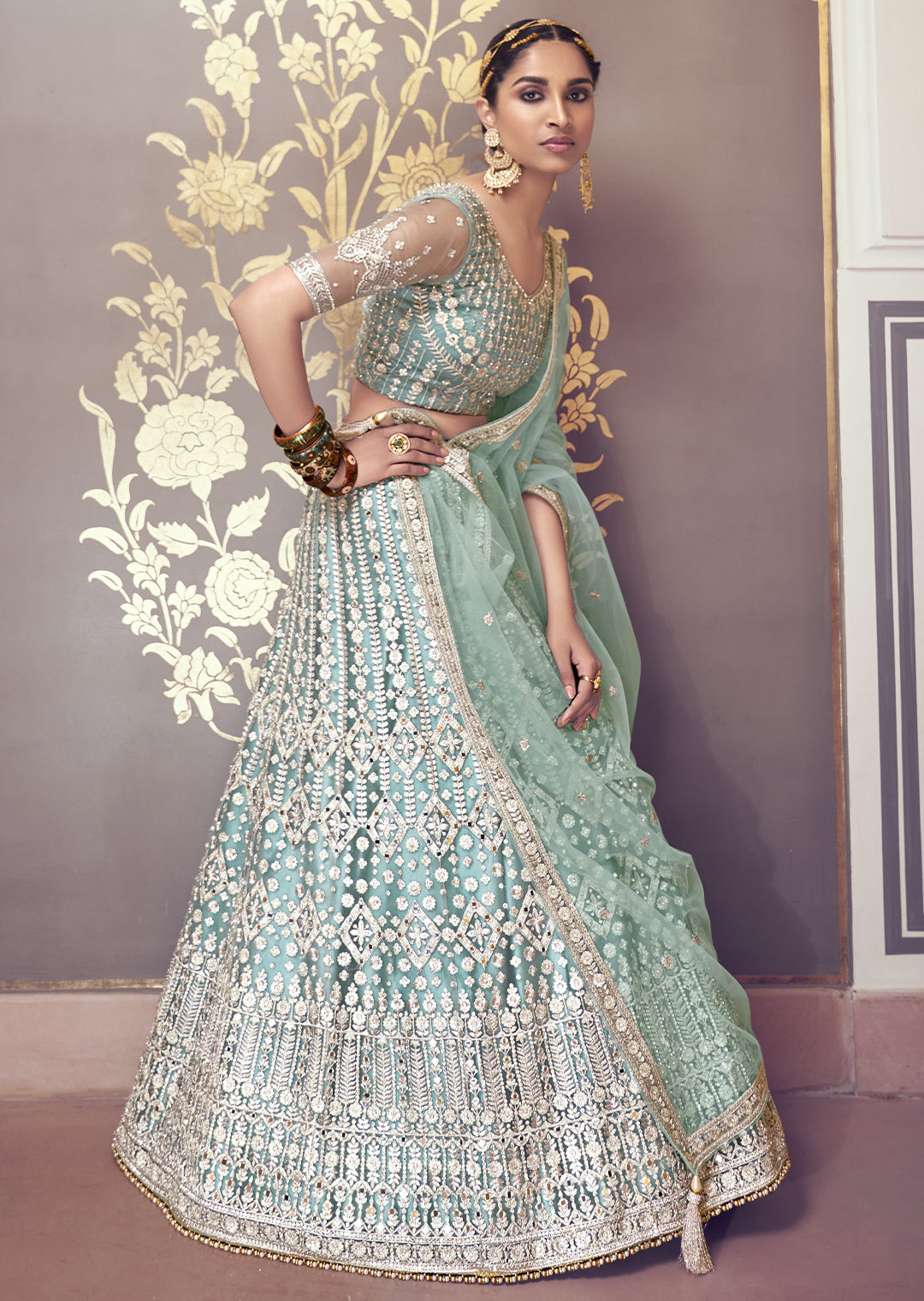 TURQUOISE GREEN HEAVY EMBROIDERED PREMIUM NET DESIGNER LEHENGA