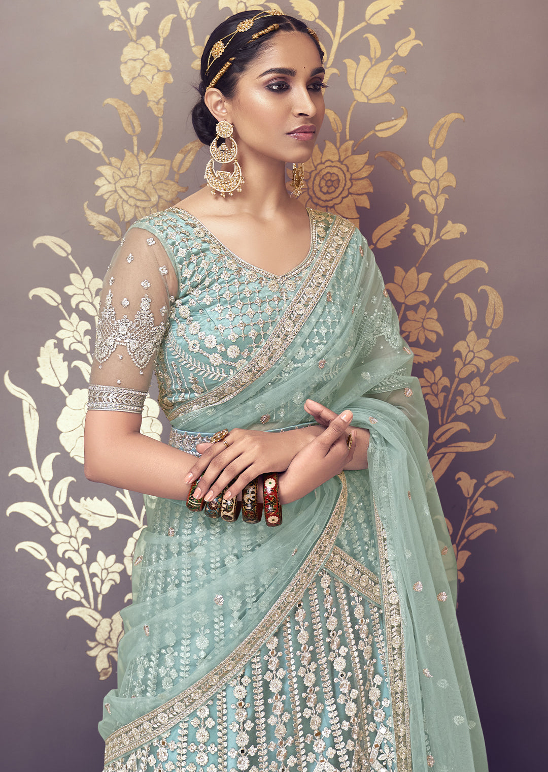 TURQUOISE GREEN HEAVY EMBROIDERED PREMIUM NET DESIGNER LEHENGA