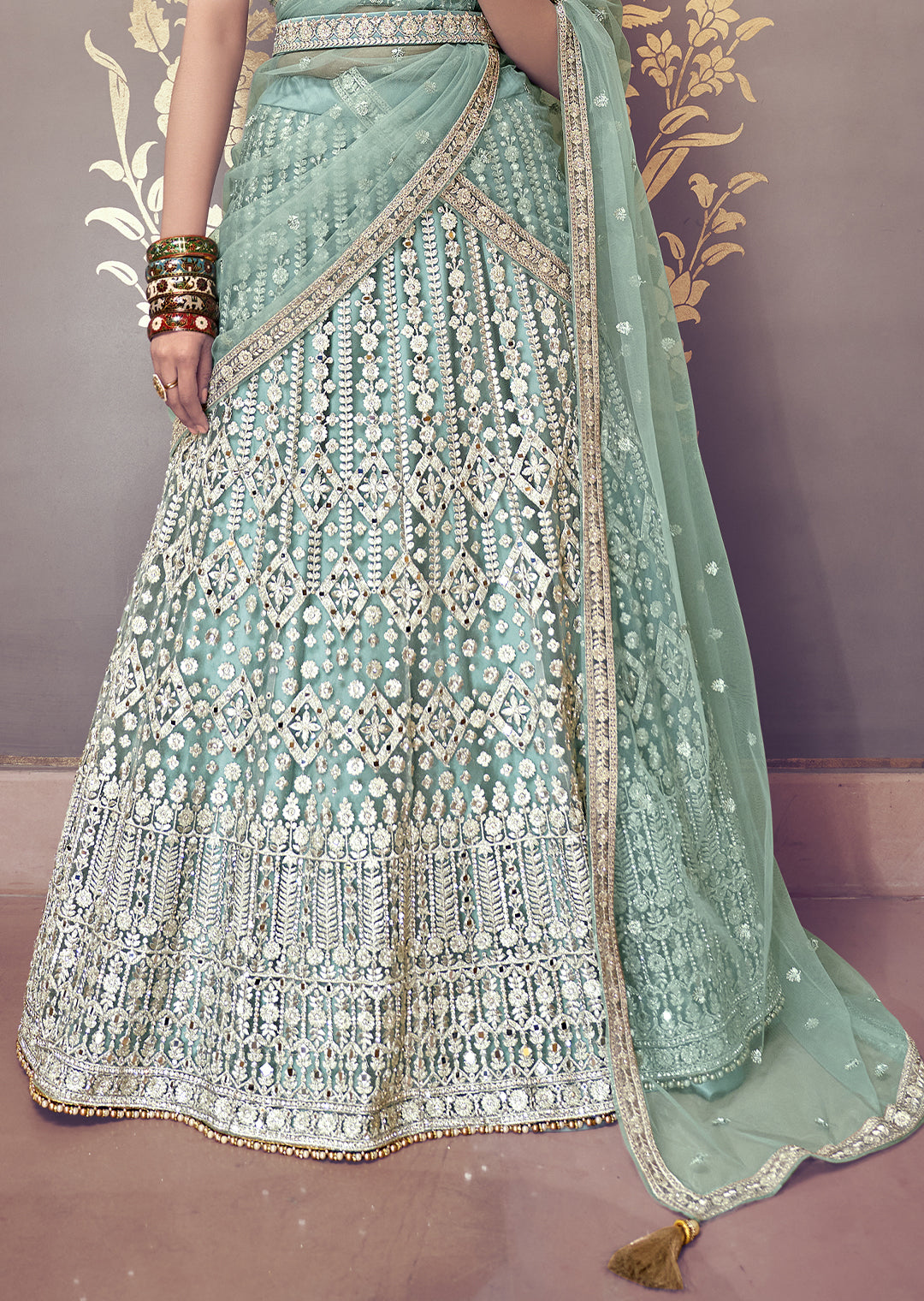 TURQUOISE GREEN HEAVY EMBROIDERED PREMIUM NET DESIGNER LEHENGA