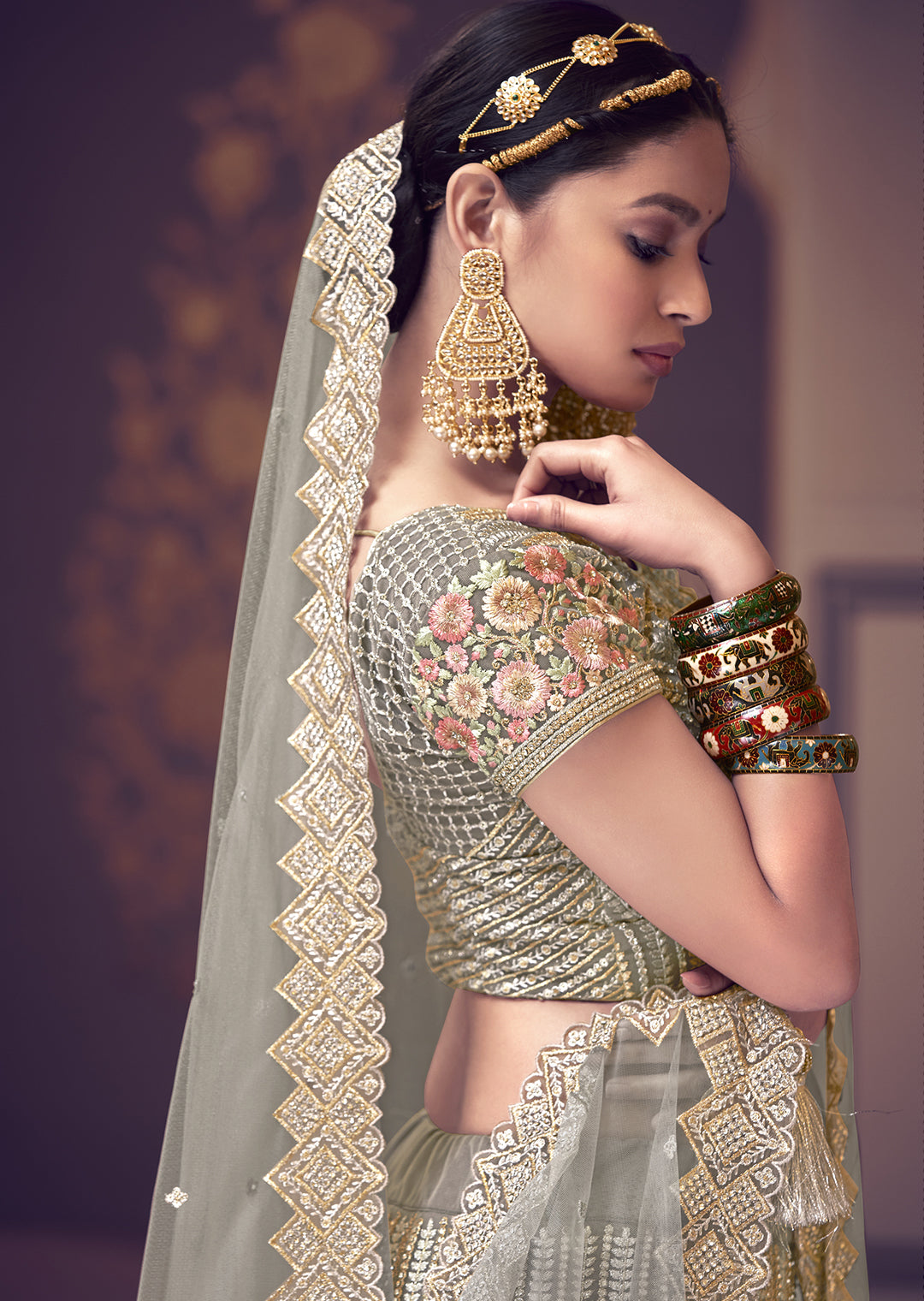 SAGE GREEN HEAVY EMBROIDERED PREMIUM NET DESIGNER LEHENGA
