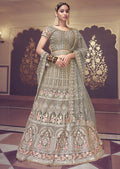 SAGE GREEN HEAVY EMBROIDERED PREMIUM NET DESIGNER LEHENGA