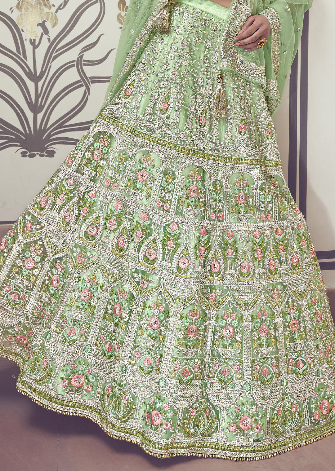 DEEP TEA GREEN HEAVY EMBROIDERED PREMIUM NET DESIGNER LEHENGA