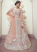 PEACH PINK HEAVY EMBROIDERED PREMIUM NET DESIGNER LEHENGA