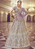 LAVENDER PURPLE HEAVY EMBROIDERED PREMIUM NET DESIGNER LEHENGA