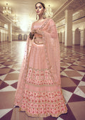 PEACH ORANGE HEAVY EMBROIDERED PREMIUM NET DESIGNER LEHENGA