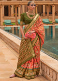 CARROT ORANGE WOVEN TRADITIONAL PATOLA SILK SAREE WITH FOIL PRINT WORK