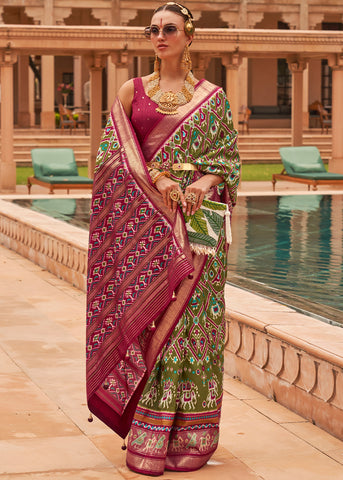 MOSS GREEN WOVEN TRADITIONAL PATOLA SILK SAREE WITH FOIL PRINT WORK