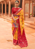 MUSTARD YELLOW WOVEN PATOLA SILK SAREE