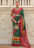 GREEN WOVEN TRADITIONAL PATOLA SILK SAREE WITH KHATLI WORK