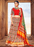 WHITE & RED	HAND CRAFTED PATOLA SILK LEHENGA WITH EMBROIDERED SILK BLOUSE