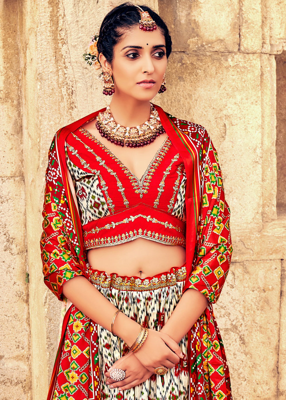 WHITE & RED HAND CRAFTED PATOLA SILK LEHENGA WITH EMBROIDERED SILK BLOUSE