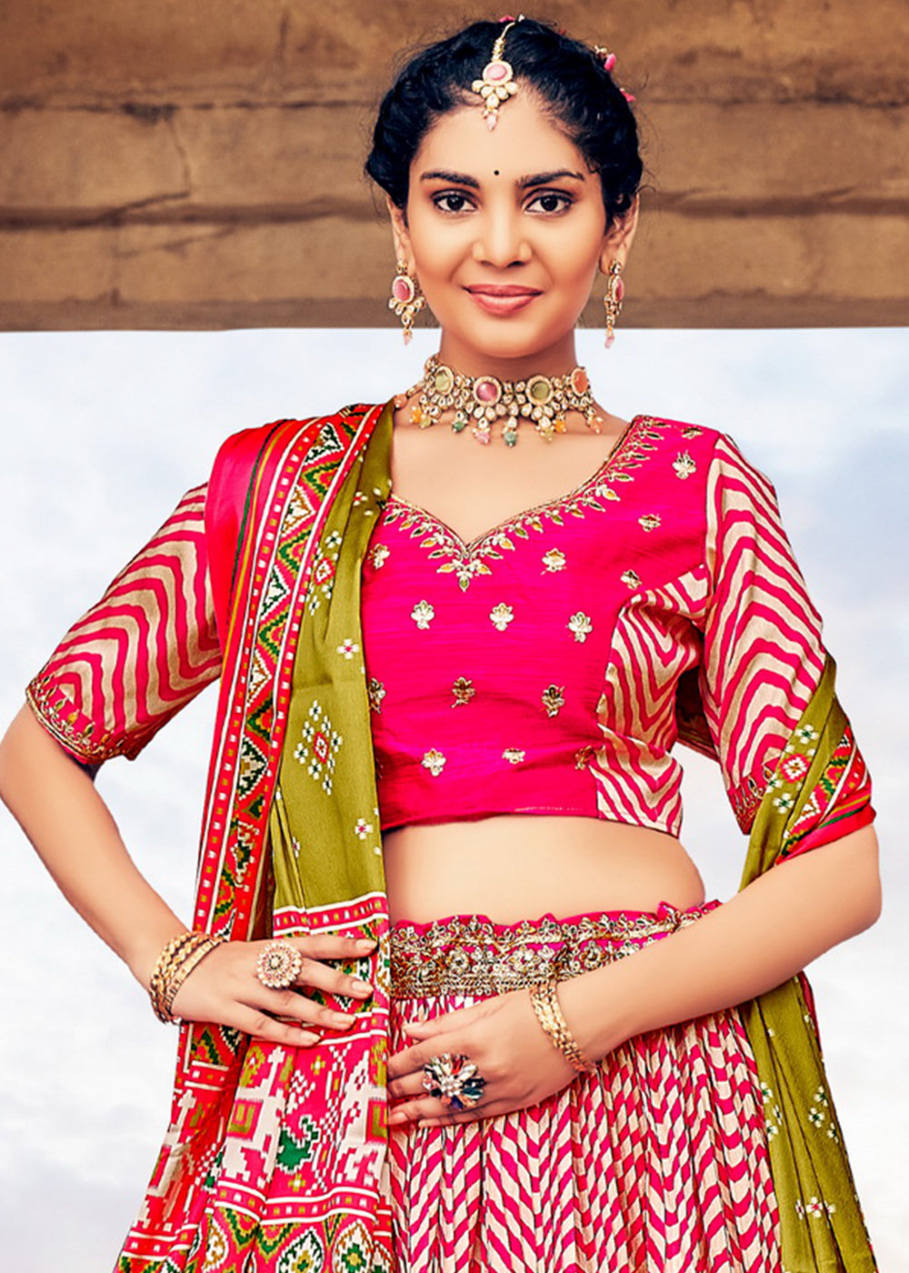 HOT PINK HAND CRAFTED PATOLA SILK LEHENGA WITH EMBROIDERED SILK BLOUSE